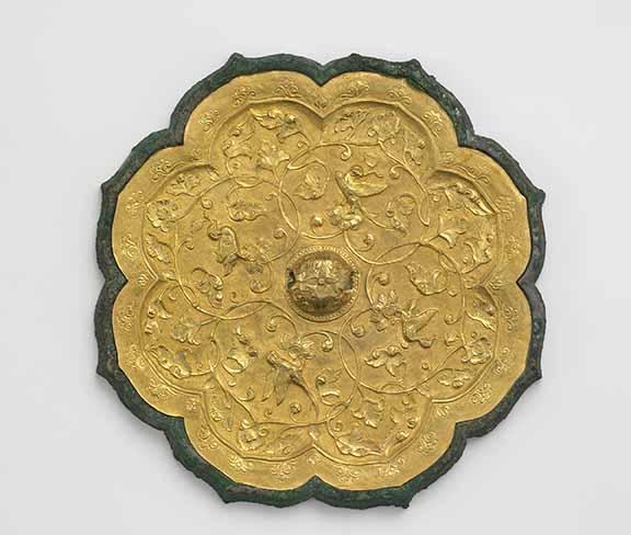 Foliated mirror with birds and floral scrolls, China, early or mid-Tang dynasty, late 7th or early 8th century, cast bronze and applied gold plaque with repoussé, chased and ring punched decoration