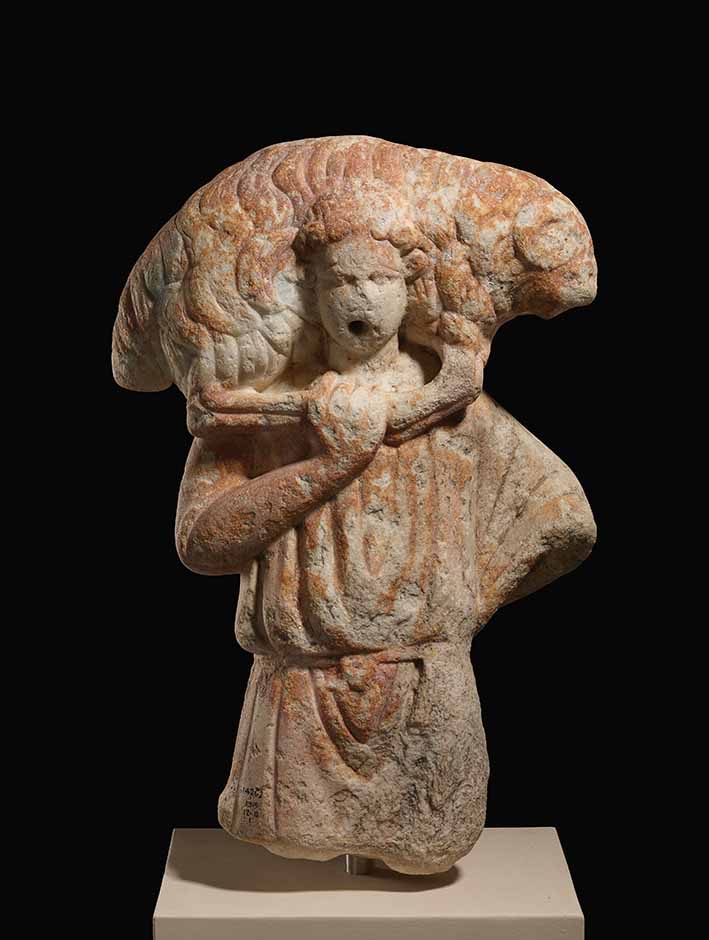 Statue of a Ram bearer, 3rd-4th century, marble, Zubeir, Iraq. The British Museum © The Trustees of the British Museum