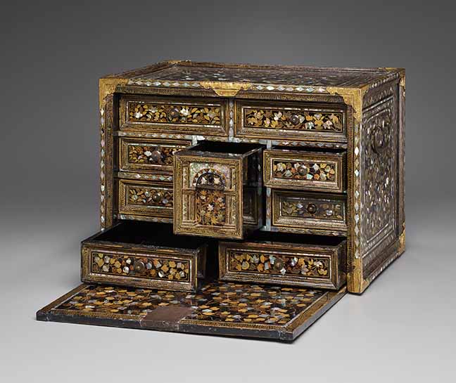 Fall-Front Cabinet with Flowers and Birds, Japan, Momoyama period (1573–1615), late 16th century. Hinoki cypress with black lacquer, sprinkled gold lacquer, inlaid mother-of-pearl, and bronze fittings. Yale University Art Gallery, Purchased with a gift from the Japan Foundation Endowment of the Council on East Asian Studies and with the Leonard C. Hanna, Jr., Class of 1913, Fund