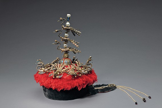 Court hat with phoenixes. Probably Imperial Workshop, Beijing, 18th or 19th century, sable, velvet, silk floss, pearls, tiger’s-eye stone, lapis lazuli, glass, birch bark and metal with gilding, and kingfisher feather, Palace Museum © The Palace Museum